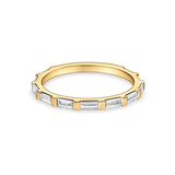skinny baguette wedding band in yellow gold. made with lab grown diamonds and recycled precious metals