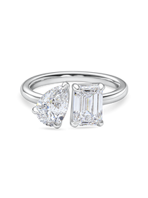 front view of a 2 carat toi et moi engagement ring. Lab Grown pear and emerald cut diamonds in platinum. This engagement ring is Handmade in London, UK, using recycled precious metals. 