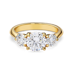 front view of round trilogy engagement ring featuring three lab grown round diamonds in yellow gold